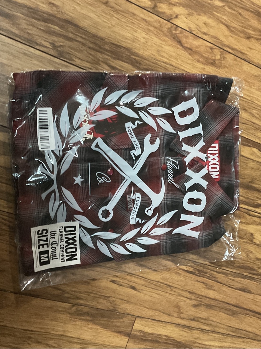 DIXXON Red and Black Plaid Tee with White Graphic Crest